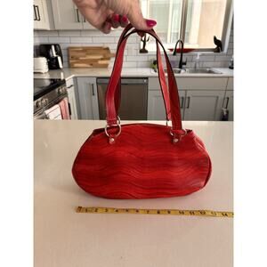 Abaco Paris Textured Oval Red Shoulder Bag